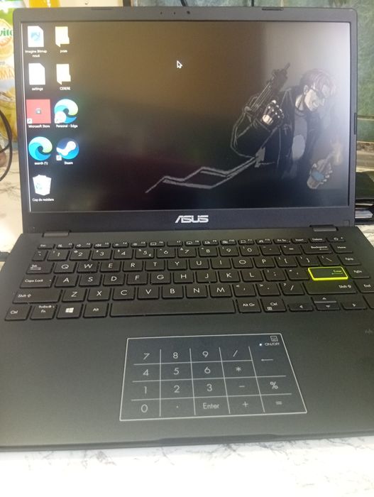 Laptop asus e 410M