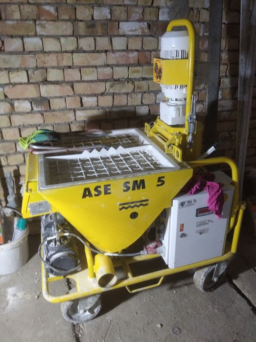 Штукатурка  механизированная гипсовыми смесями по маякам , установка м