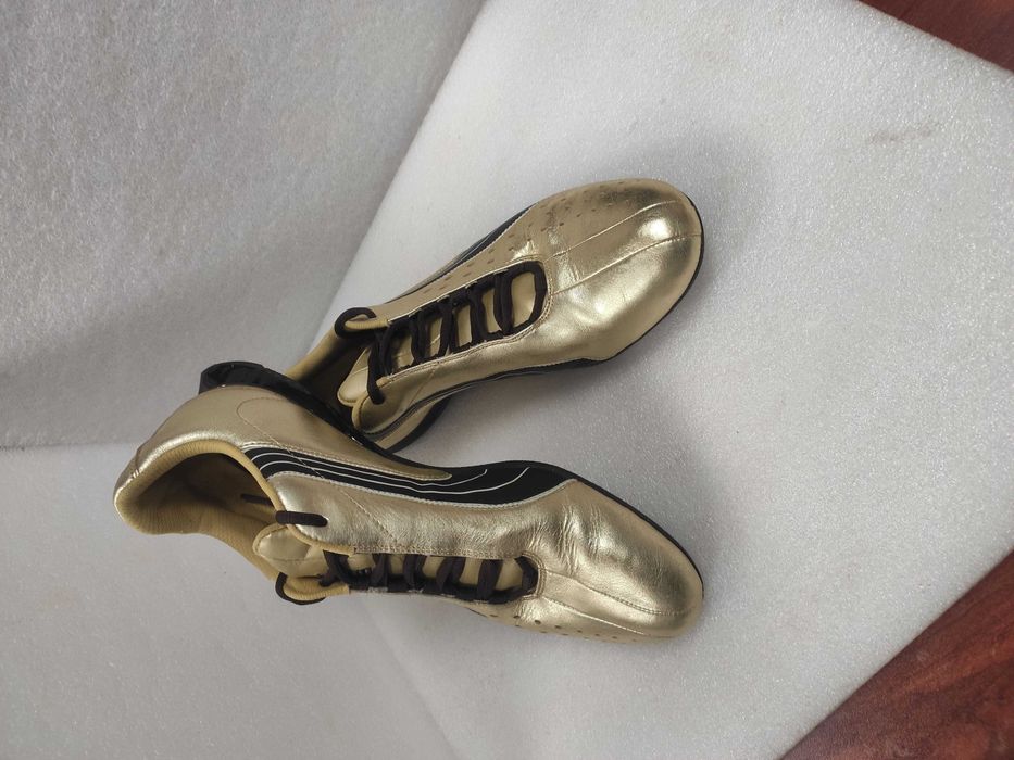 Kецове/сникърси/маратонки PUMA злато.