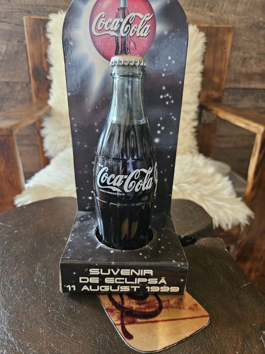 Sticlă Coca-Cola