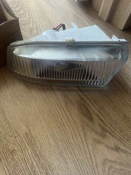 Подфарник новый