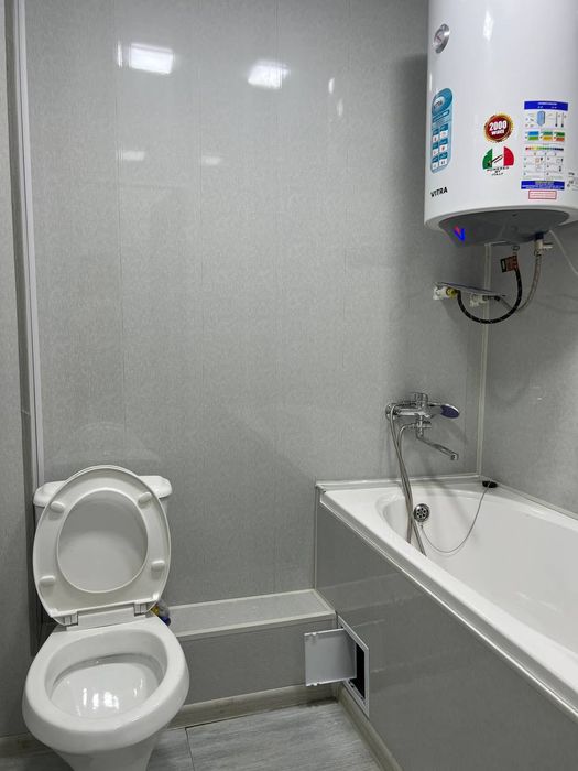 2 х комнатную квартиру Сергели Спутнике с ремонтом в деревянном доме