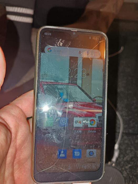 Телефони за части