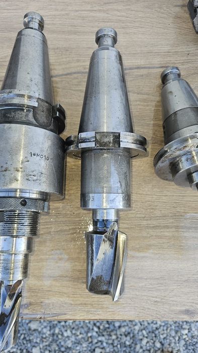 Lot of ISO 50 industrial tooling – arbors, milling heads, and boring head