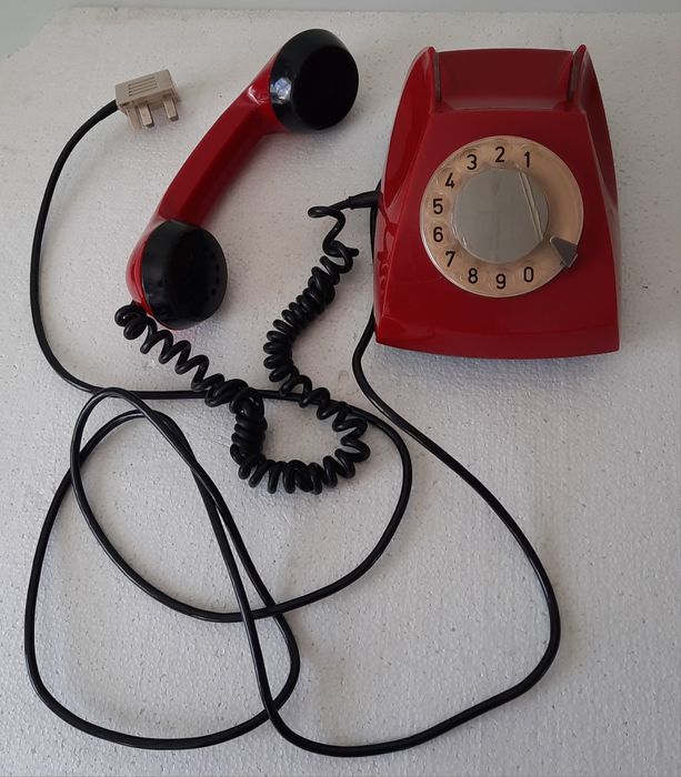 Телефон дисковый.