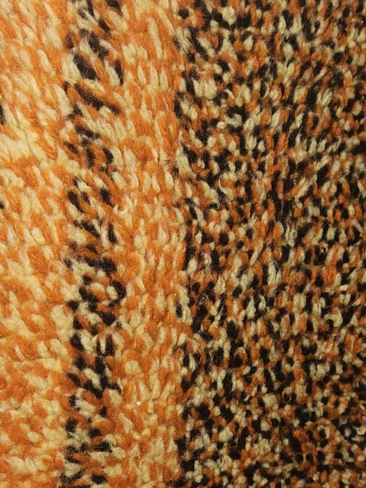 Цветен вълнен китеник