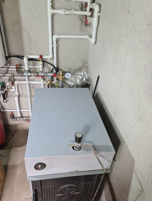 Vând centrală fontă 32kw