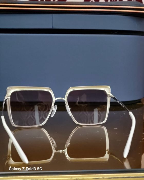 Продам женские очки Prada