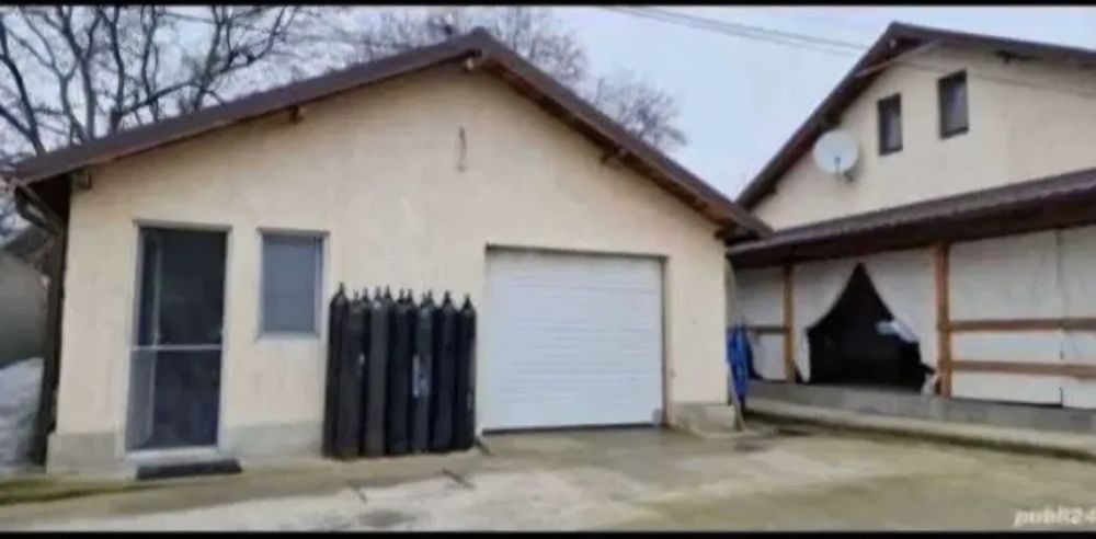 Casa Garaj cu teren de vânzare