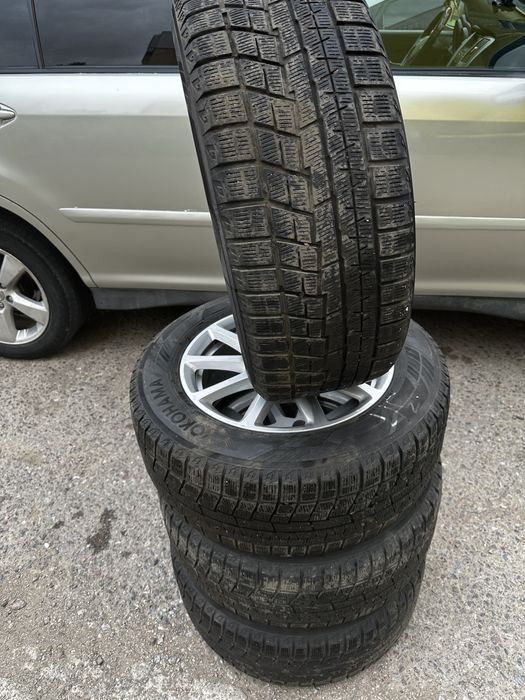 Продам зимние шины с дисками 225 55 R16