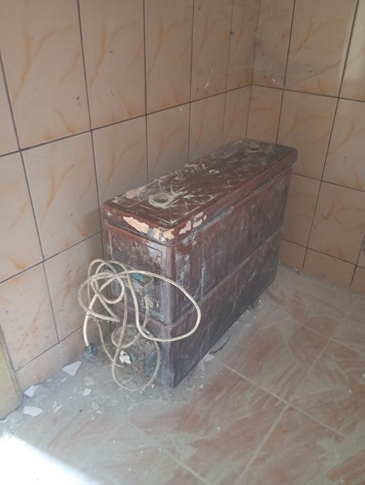 Soba  veche teracota și electrică