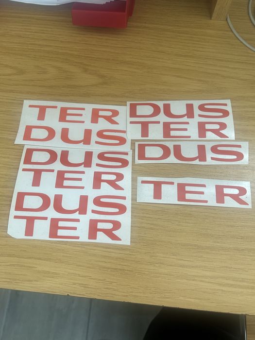 Ornamente litere bandouri Duster model nou argintii si portocalii