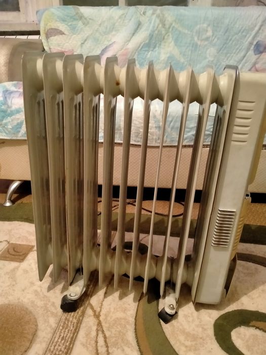 Масляный радиатор, обогреватель