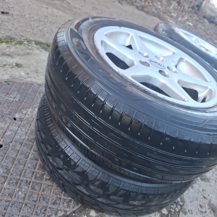 Vand 4 jante w golf cu cauciucuri bune 195x65x15 pret 1000 lei