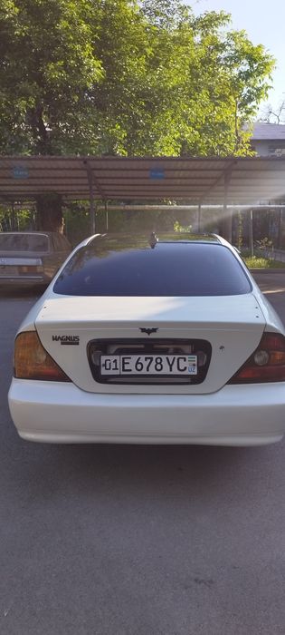 деу Магнус, год:2002