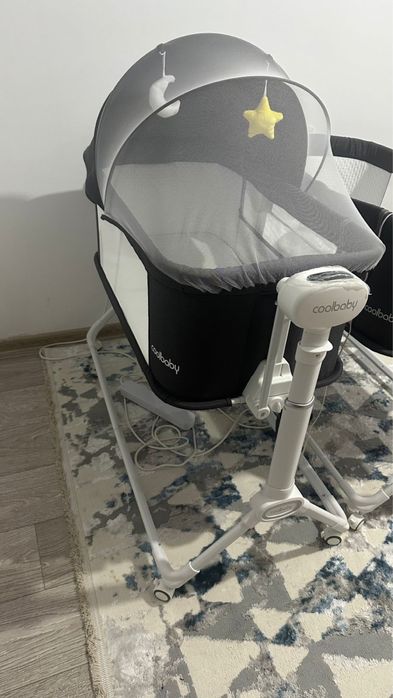 Электрическая приставная кроватка для новорожденных