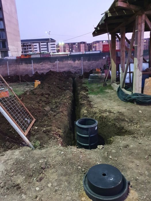 Excavator /bobcat pentru șanțuri, fose ,fundatii