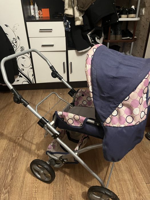 Игрушечная коляска