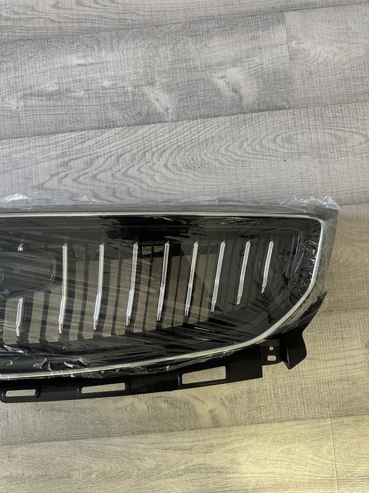 Решетка Geely Emgrand