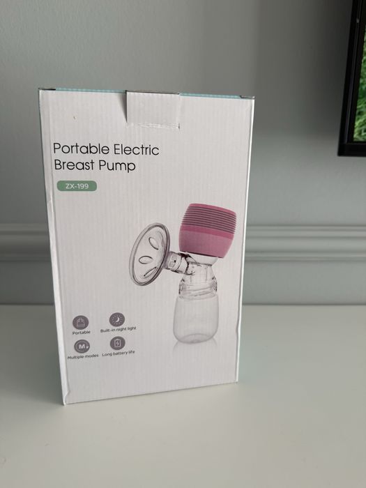 Молокоотсос для грудного молока