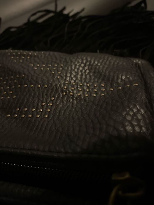 Кожаная сумочка в стиле бохо