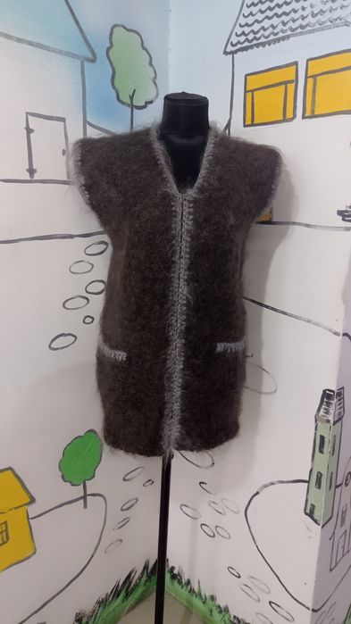 Продам жилет пуховый