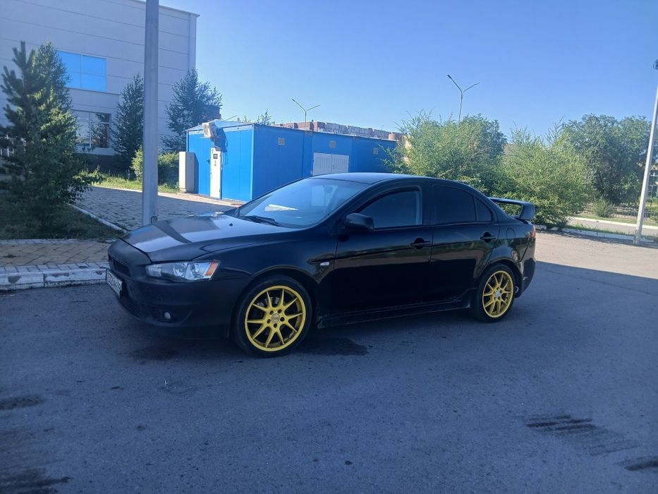 Митсубиси Лансер