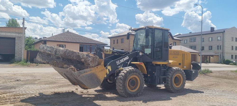 Услуга  Погрузчика и самосвала вывоз мусора