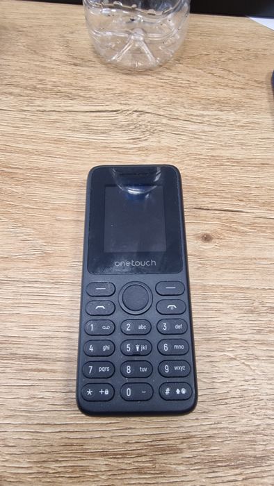 Телефон с копчета TCL
