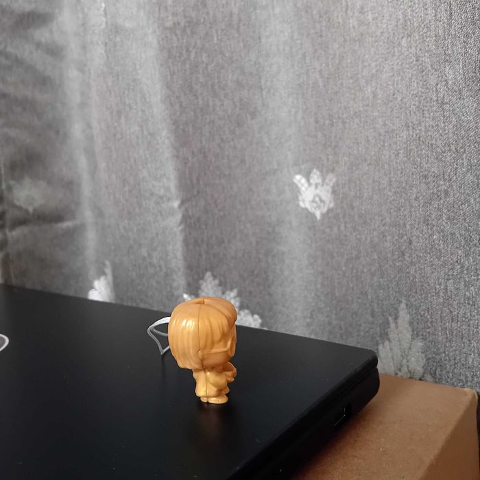 Figurina Harry Potter Gold.