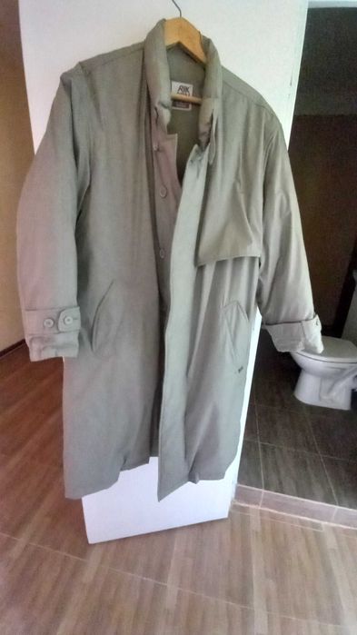 Пухено  палто с колан размер 48/50