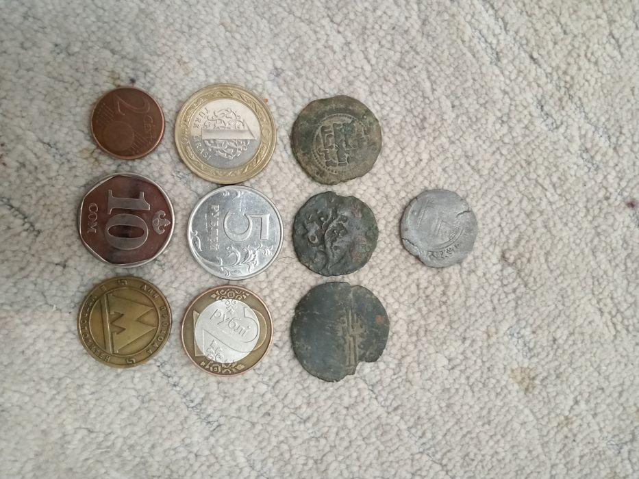 Купюра и монета и доллар