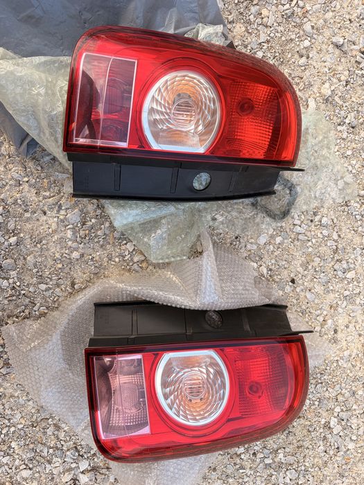 Stopuri originale Dacia Duster 1, 2010–2013, stânga + dreapta, stare foarte bună