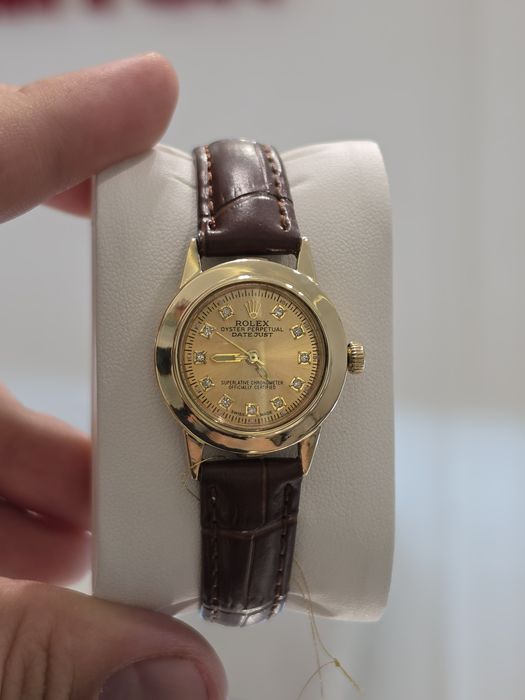 Прожам женские золотве часы Rolex