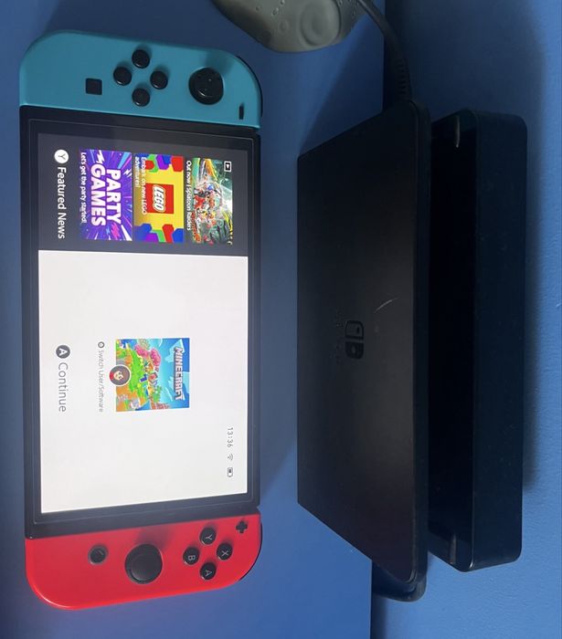 Nintendo Switch OLED (Пълен комплект) + Pro Контролер + 10 Игри + Калъф