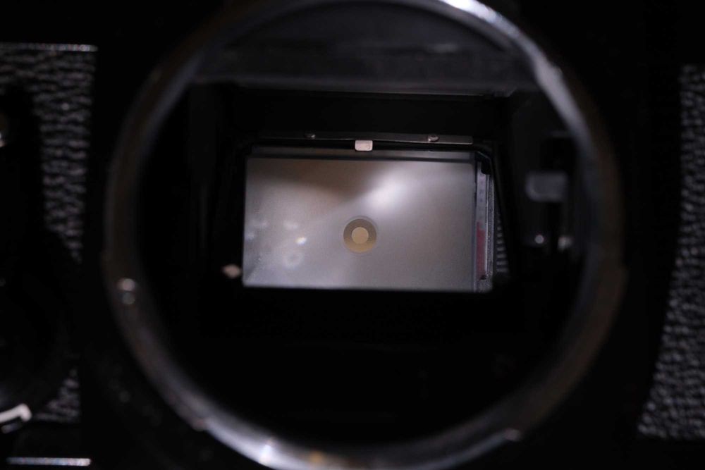 Canon EF - SLR pe film + Canon FD 50mm F/1,4 SSC