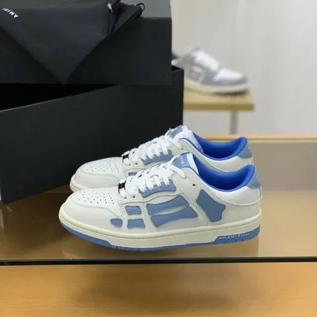 Amiri Skel Top Low Sneakers "White/Light Blue"