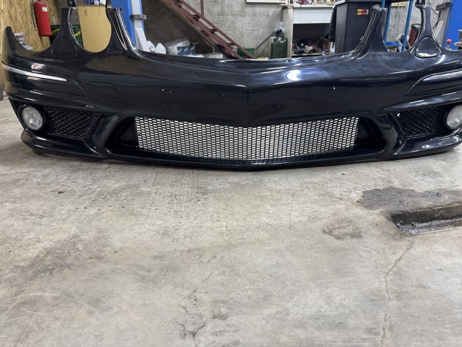 Передный бампер W211