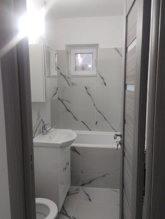 Vând apartament cu doua camere parter decomandat