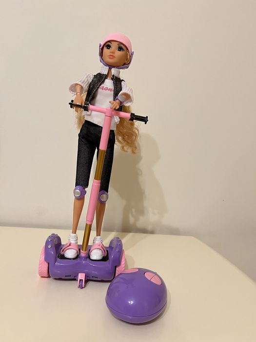 Кукла на самокате 2000 тг