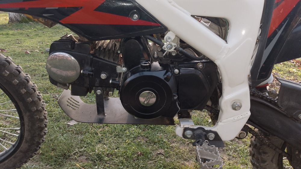 Vând cross KXD 125cc+casca