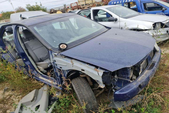 Motoras macara geam spate stanga Dacia Logan prima generatie