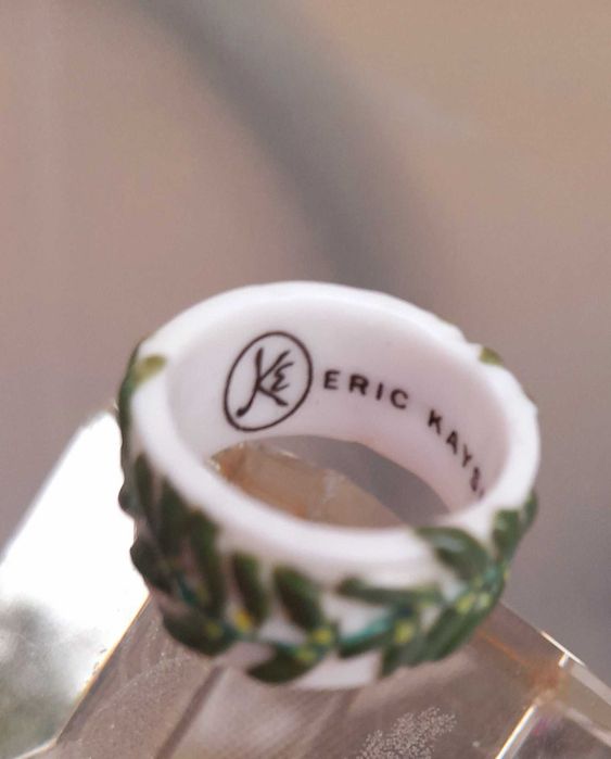 2 inele:Swatch metal argintat si Eric Kayser portelan lucrat manual.