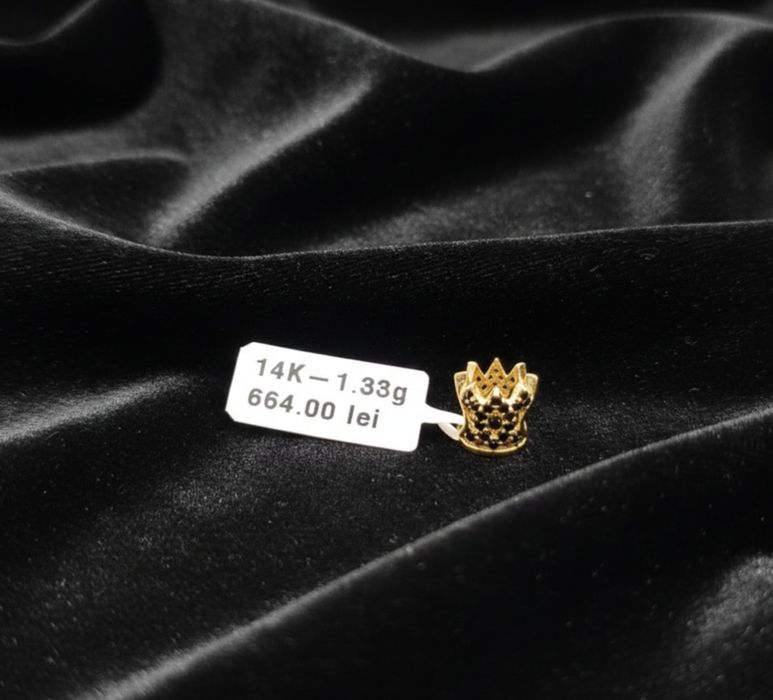 Charm aur 14k 1.33gr