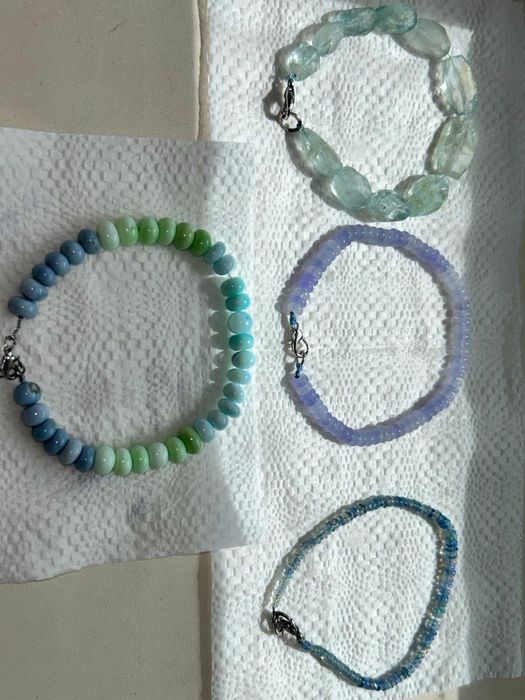 Браслеты из Танзанита, опала