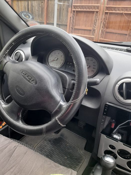 Dacia Logan, 1.6 16V • 2006 • 180.000 KM • Albastru • Navigație