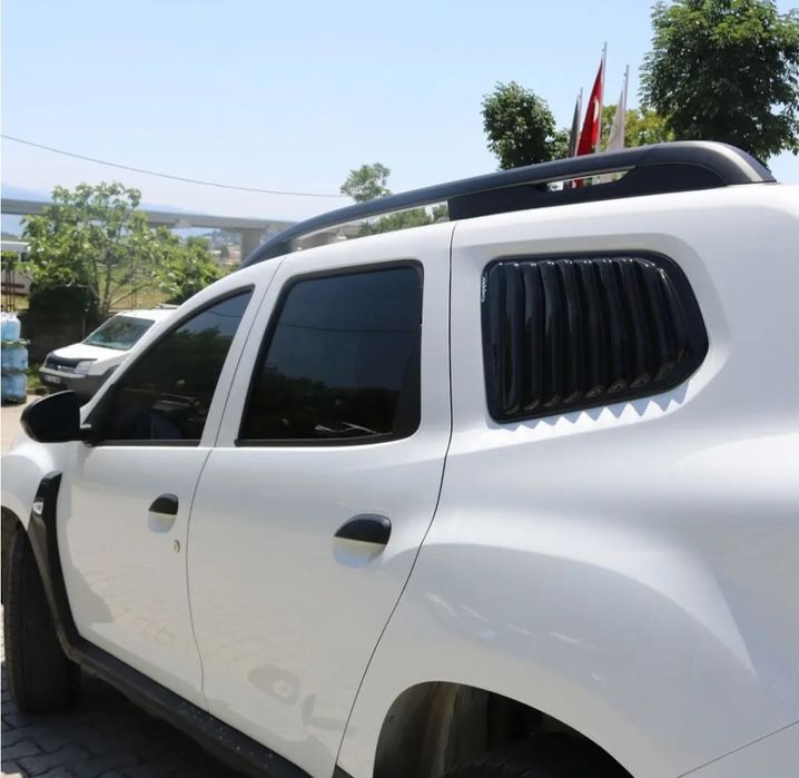 Ornamente / Protecții Geam Spate Dacia Duster 2