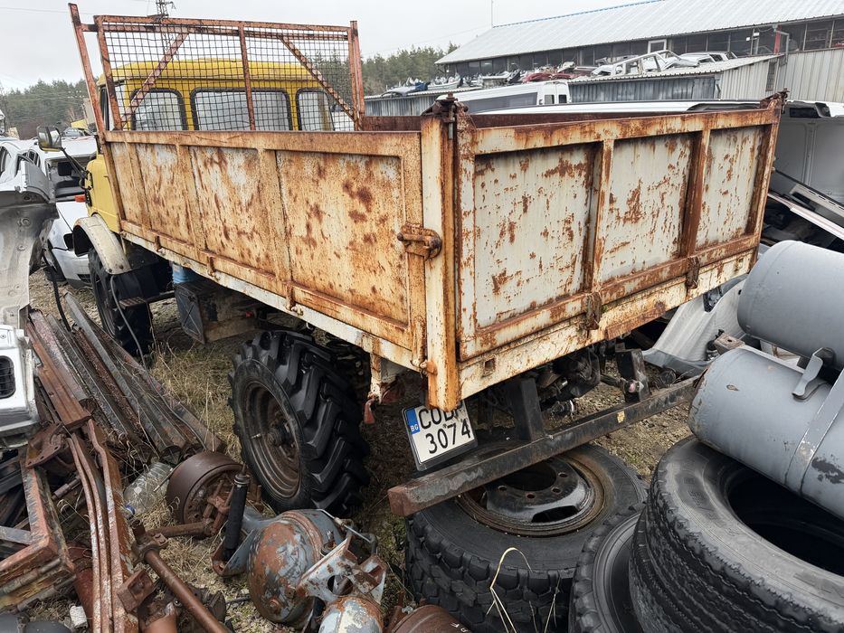 Mercedes Unimog тристранен самосвал