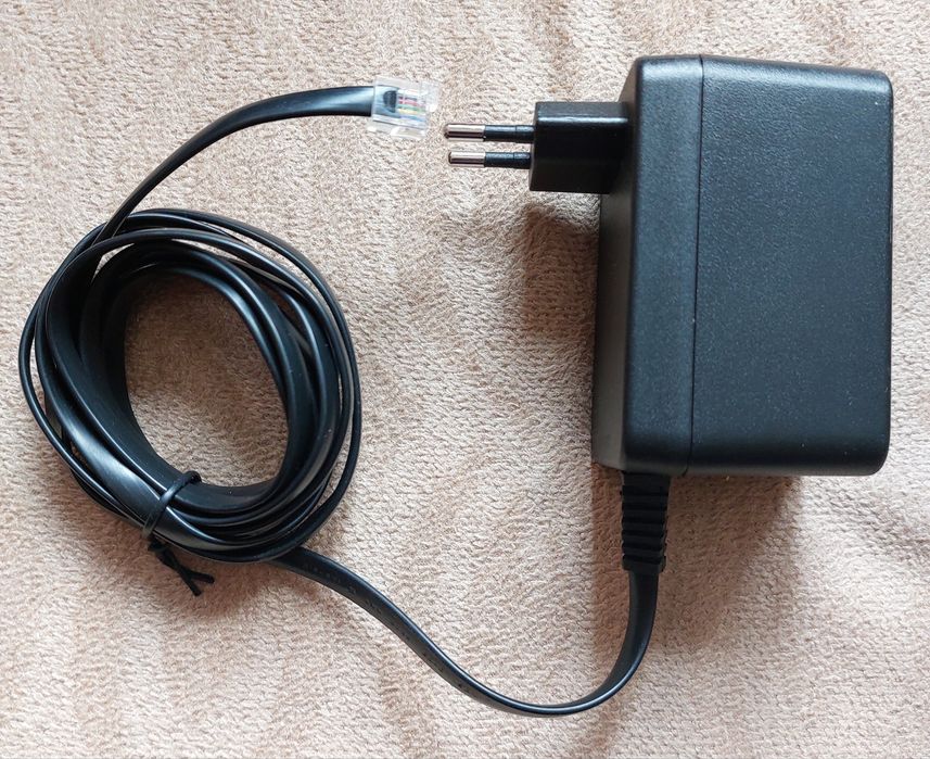 Захранващ AC/AC адаптер DV-15W15192ACUP за тел. централа Eumex 401 402