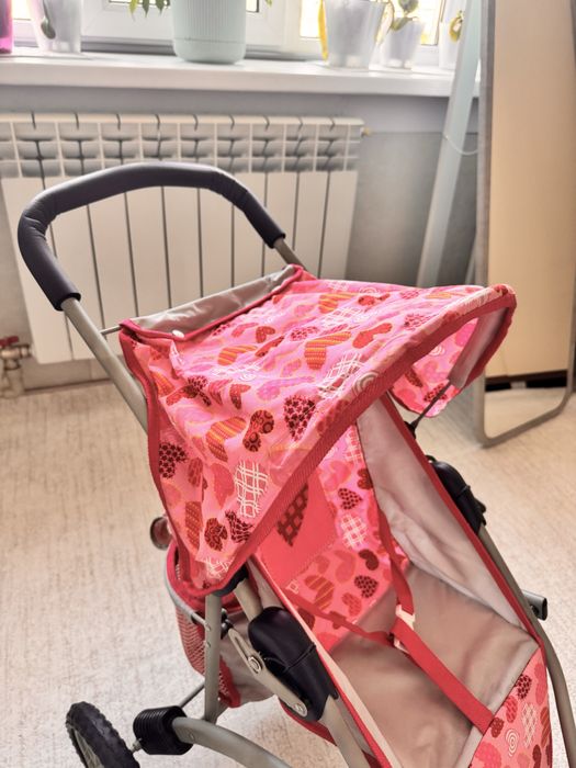 Игрушечная коляска